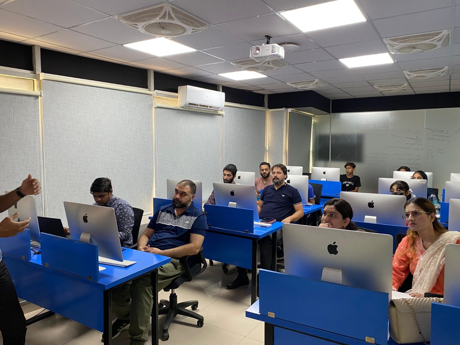 Teachers and professionals in an AI class at the BBT Lahore campus